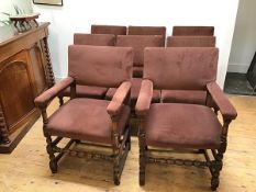 A set of eight 1920s oak dining chairs, including six side chairs and two carvers, all with