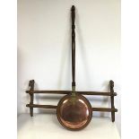 A walnut handled Edwardian copper and brass mounted bed warming pan (103cm x 28cm) and an