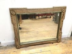 A 1920s/30s bevelled glass wall mirror within moulded and painted frame (100cm x 78cm)