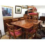 A Charles Barr yew wood dining suite of eight pieces, comprising a dining table with mahogany