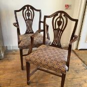 A pair of Sheraton style urn and pierced splat back open side chairs with stuffover seats, on fluted