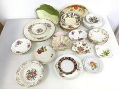 A large assortment of china including trinket dishes, saucers, side plates etc. (a lot)