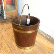 A mahogany brass bound swing handle peat pail (27cm x 30cm)