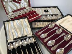 A set of six Epns grapefruit spoons, a set of six Epns coffee spoons, a set of dessert forks and