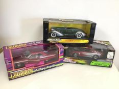 American Muscle diecast model cars including a Chevy Impala, an Auburn Speedster and a Toyota Supra,