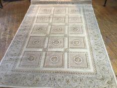 A modern Nourtex Newport Collection Roman inspired wool carpet, with five rows of three floret style