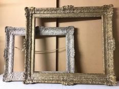 A moulded gilt picture frame (49cm x 59cm to interior) and another smaller frame (2)