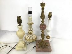 A collection of table lamps including a brass and soapstone lamp (36cm x 12cm x 12cm) (4)