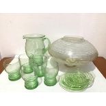 An Art Deco circular white bordered light shade (d.28cm), a set of five Art Deco green glass