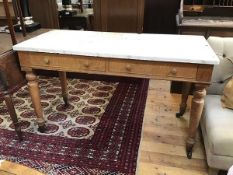 A Victorian ash marble topped washstand, lacking superstructure, fitted two dummy drawers to