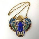 Egyptian Interest: a gilt metal and enamelled winged scarab pendant on chain, by Thomas Fattorini