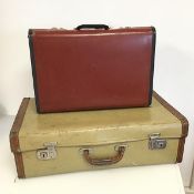 Two 1930s/40s compressed paper Utility suitcases (largest: 10cm x 16cm x 34cm)