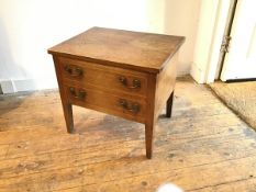 A Georgian mahogany commode stool, the rectangular top with moulded edge above two dummy drawers,