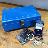 A blue leather jewellery box, a white metal and yellow metal ring and two Links of London style