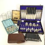 A mixed lot including a cutlery canteen with Epns knives, forks and spoons, two boxes of Epns