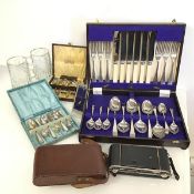 A mixed lot including a cutlery canteen with Epns knives, forks and spoons, two boxes of Epns