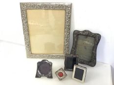 A collection of silver photograph frames (largest: 30cm x 24cm) (6)