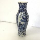 An early 20thc Chinese blue and white baluster vase, with four panels depiciting scenes with