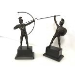 A pair of spelter Classical warrior figures, one with bow and arrow, the other spear and shield,