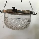 A cut crystal pendant light fitting mounted with silver plated fitting, complete with chains (h.17cm
