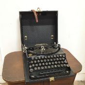 A mid 20thc Remington Compact Portable typewriter, inscribed Assembled by British Labour at the