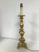 A modern table lamp with gilt finish (h.65cm to top of lamp holder)