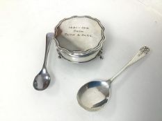 A 1915 Birmingham silver footed jewellery box (3cm x 6cm), a London silver spoon and an Epns