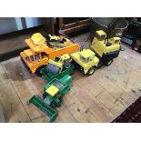 A collection of Tonka metal digger toys including a dump truck (26cm x 46cm x 21cm), bulldozer,