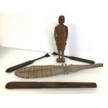 A South Pacific blade from a ceremonial paddle (52cm) and two other paddles, a club and figure (5)