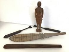 A South Pacific blade from a ceremonial paddle (52cm) and two other paddles, a club and figure (5)