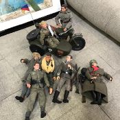 A collection of military figures all in German WWII uniforms and a motorbike with side car (21cm x