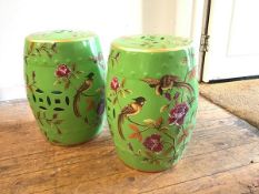 A pair of modern Chinese inspired ceramic verandah stools, with pierced rice pattern panels,