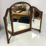 A 1930s mahogany triptych dressing table mirror, each panel of bevelled glass (56cm x 77cm fully