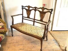 An Edwardian rosewood and inlaid two seater bedroom/drawing room sofa with pierced inlaid splat back