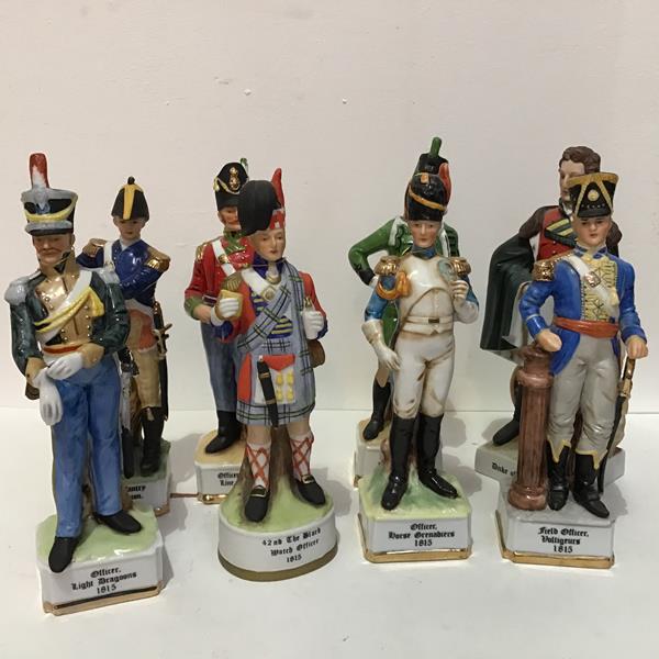 A collection of polychrome enamelled decorated bisque military figures including Infantrymen,