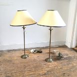 A pair of cast brass column table lamps by Valsan, raised on circular moulded beaded bordered bases,