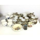 A Meito china tea service including eleven tea cups (h.7cm), saucers, side plates, sandwich