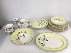 A set of five Johnson Brothers dinner plates, five side plates, bowl, two serving dishes, one with