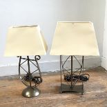 An anodised bronzed metal finish harp shaped table lamp and an anodised bronze finish square form