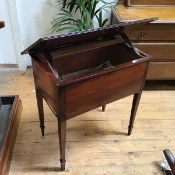 A 19thc mahogany music or reading table, with hinged top above a recess, on square tapering legs