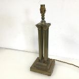 A brass table lamp, with four Corinthian style columns on tiered base (41cm x 14cm x 14cm)