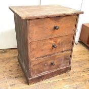 An early 20thc chest of drawers, the rectangular top with overhang to either side above three
