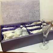 A set of six Edinburgh Crystal slice cut champagne flutes complete with original presentation box,