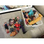A collection of toy figures including Incredibles, Pirates of the Caribbean, Monsters Inc., The