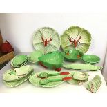 A group of 1930s Carltonware, with lobster decoration and fruit and flower decoration, includes