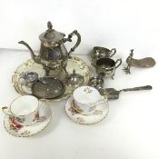 A mixed lot including an Epns table ornament Peacock (10cm x 16cm x 7cm), a salver, a teapot, milk