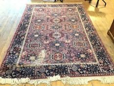 A Mossoul Louis de Poortere machine made rug, the centre panel with three rows of stylised