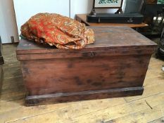 A 19thc stained pine kist, with drop handles to side and interior fitted candlebox and two