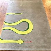 A Rug Company handmade children's nursery rug with coiling snake design, jade field (228cm x 150cm)