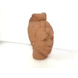 A Studio Pottery clay bust of an East Asian male head, stamp to interior and verso, CMV (29cm x 15cm